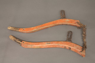 A pair of wooden and iron horse hames