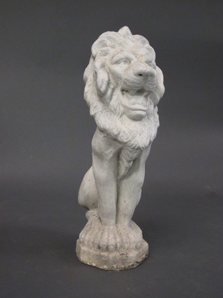 A white painted figure of a seated lion 20"