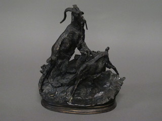 A bronze figure group of goats 9"