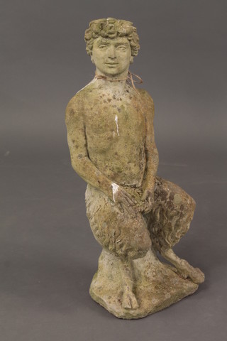 A concrete figure of a seated Pan, 27"  ILLUSTRATED