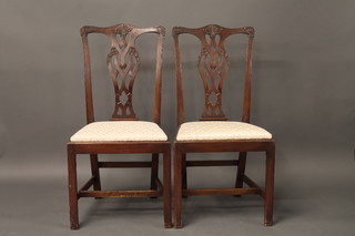 A set of 6 Chippendale style mahogany slat back dining chairs  with upholstered drop in seats
