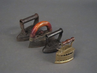 5 various flat irons, an iron slug and 2 iron stands