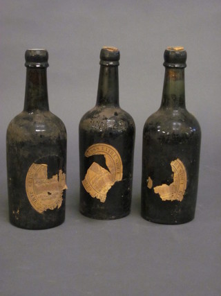 3 vintage bottles of Guinness