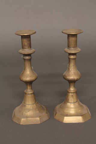 A pair of 19th Century brass candlesticks with ejectors 10"