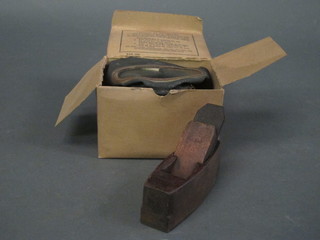 A wooden moulding plane marked M Hurst and a WWII Civilian  gas mask box