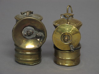 An American Autolite brass mining/caving lamp together with a  Premier caving lamp