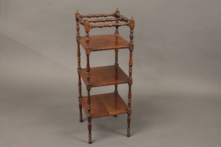 A Victorian square walnut 3 tier what-not, raised on turned and block supports 12"