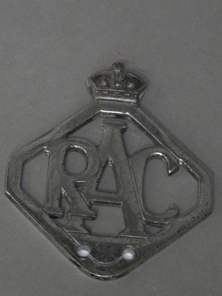 A pierced metal RAC badge
