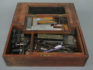 2 wooden boxes containing various engineering tools