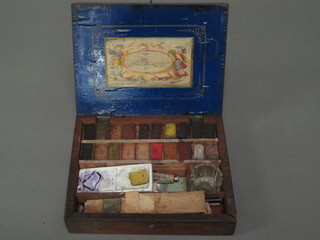 A Victorian mahogany paint box and contents of artist paint