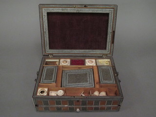 A 19th Century inlaid sewing box with hinged lid, fitted various ivory cotton reels etc