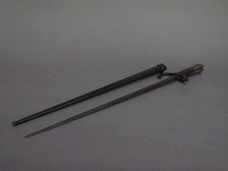 A chassepot bayonet the blade dated 1876 complete with metal scabbard  ILLUSTRATED