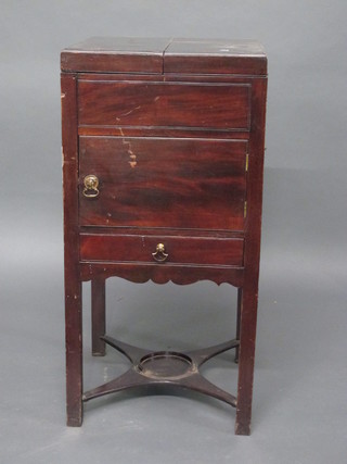 A Georgian mahogany enclosed wash stand, the base fitted a  cupboard and drawer, raised on square tapering supports 16"