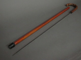 A 19th Century sword stick with 27 1/2" blade, marked Toledo