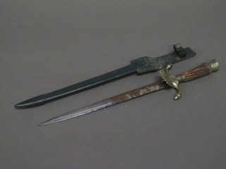 A German double edge hunting knife, the bladed marked  Solingen, 10 1/2" complete with scabbard  ILLUSTRATED