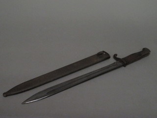 A WWI Mauser bayonet, the blade marked Solingen, complete  with scabbard