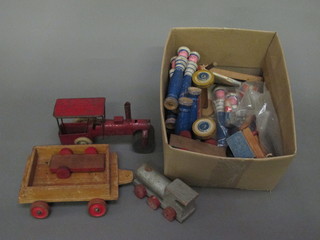 A tin plate model steam roller, a wooden train, various wooden  sailors etc