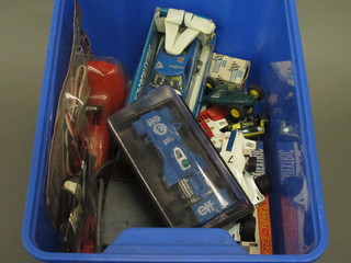 A collection of Scalextric and other toy cars