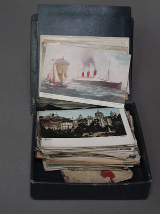 A handkerchief box containing various postcards