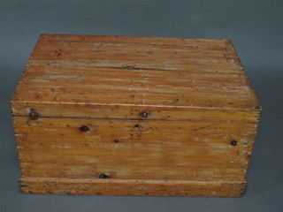 A pine trunk with hinged lid and iron drop handles 30"