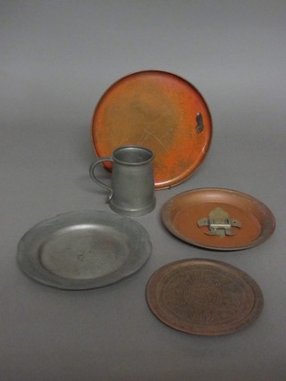 A planished pewter tankard marked RMS Queen Mary, a circular  pewter dish and 3 copper dishes