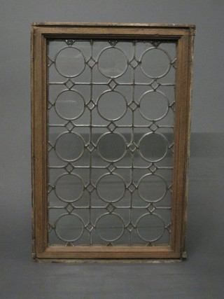 An 18th/19th Century lead glazed window contained in an oak frame 36" x 22"