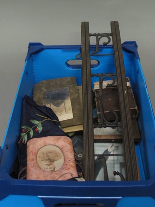 A framed photograph, a National Provincial Bank money box in  the form of a book and other curios