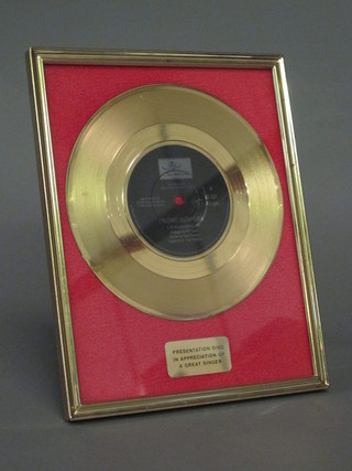 A Phil Collins 45rpm Gold Disk for You Can't Hurry Love
