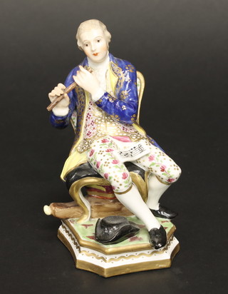 A 19th Century German porcelain figure of a seated gentleman musician with flute, flute f, 6"