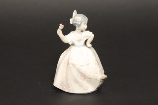 A Lladro figure of a girl dancing number 5.373, 5", boxed