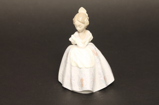 A Lladro figure of a seated girl number 5.374, 5", boxed