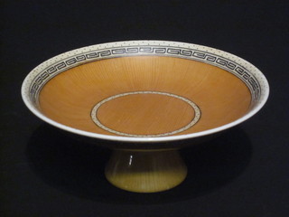 An Oriental orange glazed pedestal bowl, base with 6 character mark, 6 1/2"