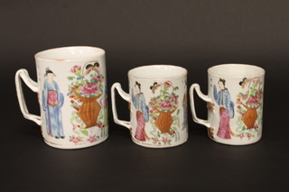 A set of 3 graduated 18th/19th Century Satsuma porcelain mugs with strap handles decorated court figures