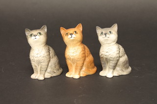 A Royal Doulton figure of a seated grey cat 3" and 2 Beswick  figures of seated cats
