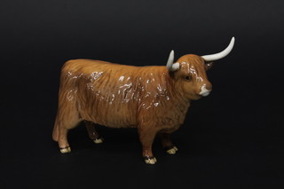 A Beswick figure of a standing Highland Cow 6"