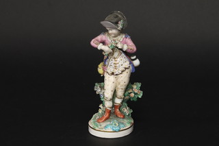 An 18th/19th Century porcelain figure of a standing gentleman, f and r, 6"