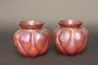 A pair of Art Nouveau red glass globular shaped vases 5"