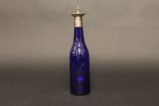 A Bristol blue glass club shaped decanter with silver mount 12"