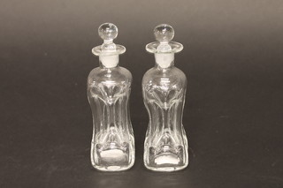 A pair of small square pinched glass decanters 5"
