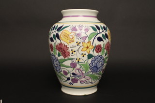 A large and impressive Poole Pottery vase with floral decoration,  the base monogrammed NB and signed G Haskins, 12 3/4"