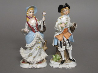 A pair of porcelain figures - Lady and Gentleman 10"