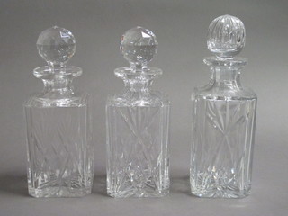 3 cut glass spirit decanters and stoppers