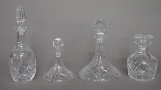 2 ships decanters and stoppers 8" and 7" and 2 club shaped  decanters and stoppers 13" and 7"