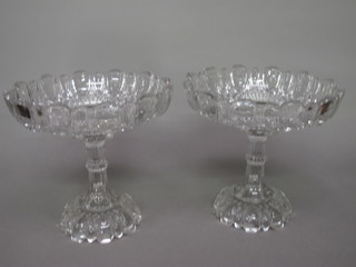 A pair of 19th Century pressed glass comports 10", 1 with chip  to base,