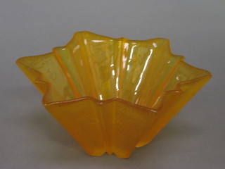 An Art Deco yellow glass star shaped dish 11"