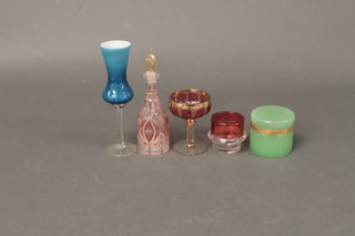 A cylindrical green glass jar and cover with gilt metal mounts 3 1/2" and a collection of glassware etc