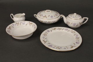 A 14 piece Royal Worcester blue Poppy tea/dinner service comprising 15 1/2" oval meat plate, 2 13" oval meat plates, twin  handled tureen and cover 9", dinner plate 12 1/2", circular bowl  9", 2 teapots, cream jug, sugar bowl, 2 cups and saucers and a  Royal Worcester June Garland twin handled tureen and cover, a  Grafton white glazed jug and a Grey Mist pattern preserve jar