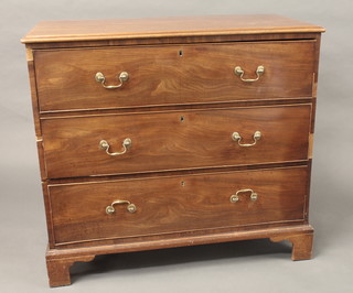 A 19th Century mahogany chest of 3 long drawers with brass  swan neck drop handles, raised on bracket feet 43"