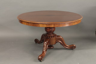 A Victorian circular mahogany snap top breakfast table, raised on  pillar and tripod supports 49"  ILLUSTRATED