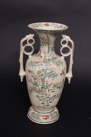 A Satsuma twin handled vase with floral decoration decorated birds amidst branches, flowers and bumble bees, 13", slight chip  to base,